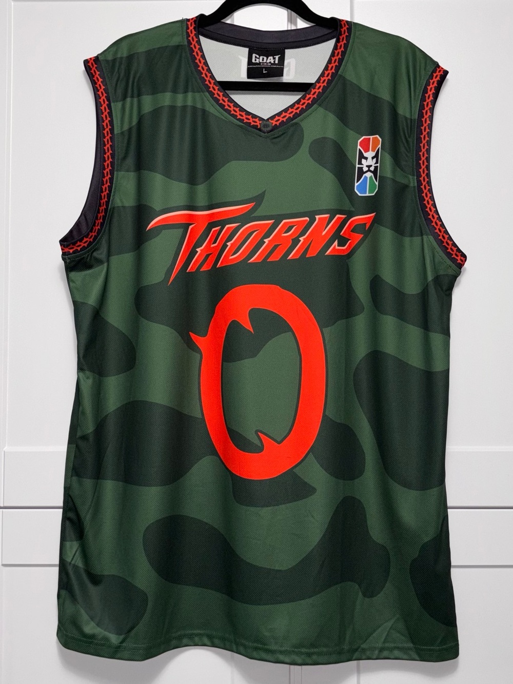 GOAT movie Thorns Basketball Jersey in Camouflage Green & Orange EUC